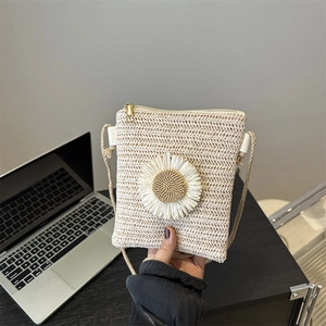 Handmade sunflower woven straw crossbody bag in cream white with gold zipper detail
