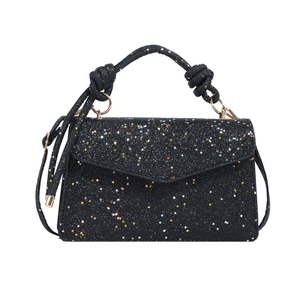 Chic black sequin crossbody bag with colorful star patterns and a knotted handle