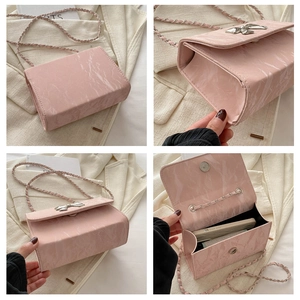 Pink marble pattern chain bag with silver bow accent and interior storage views