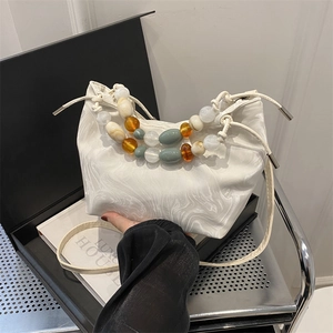 New Chinese style bucket bag with marble pattern, beaded handle, and drawstring closure