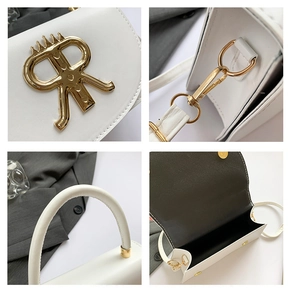 Close-up of white crossbody bag with gold crown R logo buckle and premium metal hooks