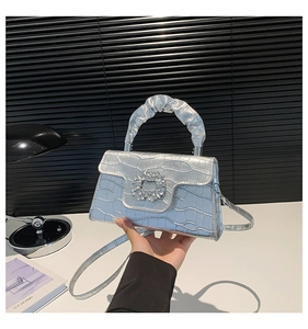 Silver crocodile texture bag with rhinestone buckle and pleated handle detail