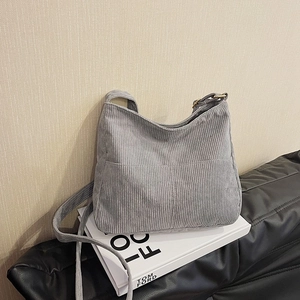 Minimalist grey corduroy tote bag with large capacity and soft vertical ribbed texture