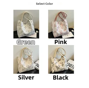 Detail view of woven handles and butterfly print on tote bags in four color options