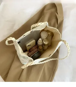 Internal view of butterfly tote bag showing large capacity for tablet and cosmetics