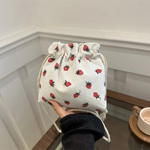 Corduroy bucket bag with strawberry embroidery and drawstring closure for women