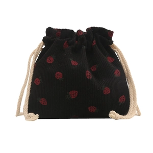 Black corduroy drawstring bucket bag featuring red strawberry embroidery and cotton rope