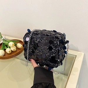 Chic black sequin crossbody bag for women with silver chain strap and shiny round sequins