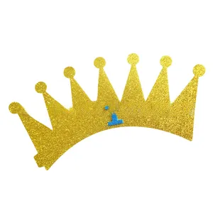 Close-up of golden glitter birthday crown featuring a blue number 1 for first party