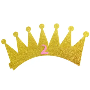 Sparkling gold glitter birthday crown featuring a pink felt number two for toddler parties