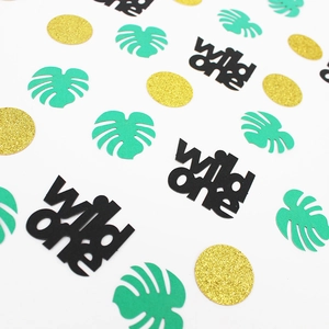 Wild One birthday party confetti set with monstera leaves and gold glitter circles