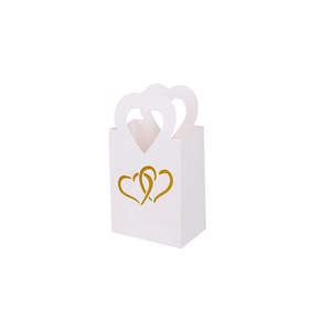 Sac cadeau blanc avec poignée en forme de cœur et motifs de cœurs dorés élégants