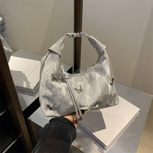 Silver dumpling bag with metallic pleated fabric and 3D butterfly ornaments for women