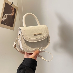 Chic cream semi-circle saddle bag with ruched texture and golden hardware handle