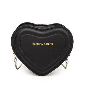 Mini heart-shaped black crossbody bag with gold chain strap and smooth faux leather