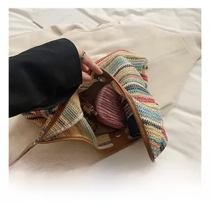 Detailed interior of the colorful striped crochet shoulder bag showing daily storage capacity