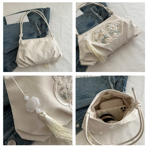 Detail view of New Chinese style beaded handbag with floral embroidery and silk texture