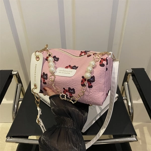 Pink cylinder pillow bag with cat print and decorative pearl flower chain strap