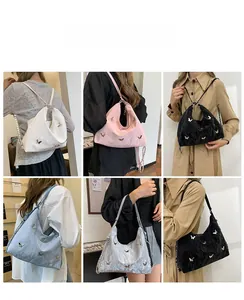 Multi-color collection of pleated shoulder bags with butterfly embroidery and chain straps
