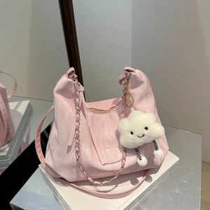 Pink minimalist hobo bag with silver chain and cute cloud pendant for daily casual style
