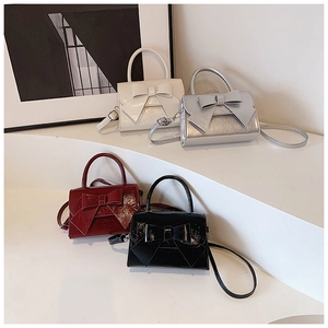 Bow accent mini square handbags in white, silver, wine red, and black patent leather