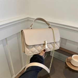 Quilted beige leather mini square bag with gold metal chain strap and top handle