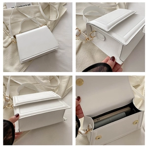 Detailed four-way view of white structured handbag with gold hardware and flap closure