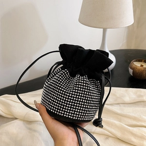 Chic black suede drawstring bucket bag with silver rhinestones and thin leather strap