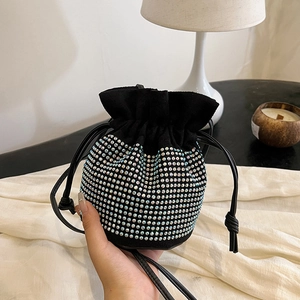 Chic black drawstring bucket bag with colorful rhinestones and adjustable strap