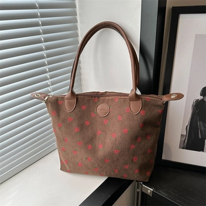 Brown corduroy tote bag with strawberry prints and comfortable shoulder straps