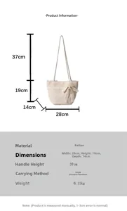 Straw beach bag dimensions 28x19x14cm with lace bow detail and 37cm handle height