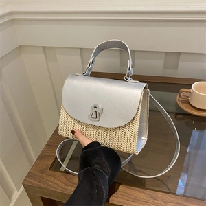 Fashionable straw handbag with silver flap and metallic lock, summer crossbody bag