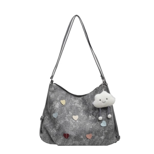 Gray snow-textured tote bag with colorful heart patches and cloud charm on white background