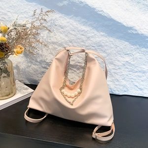 Summer soft pink tote bag with elegant silver chain and pearl decorative charms