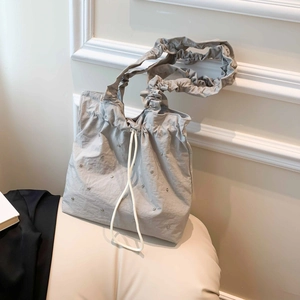 Grey pleated rhinestone tote bag with drawstring and fluffy ruched shoulder strap
