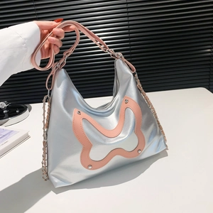 Chic silver faux leather shoulder bag with pink butterfly patch and metal chain strap