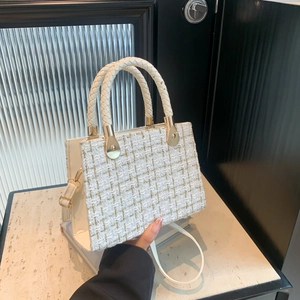 Classic checkered tweed crossbody bag with golden buckle and leather handle in cream white