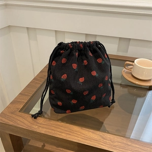 Mini corduroy bucket bag with cute strawberry print and drawstring closure in black