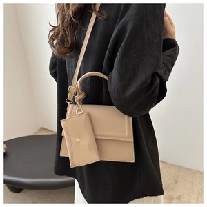 Chic beige PU leather crossbody bag with detachable coin purse and knot handle detail