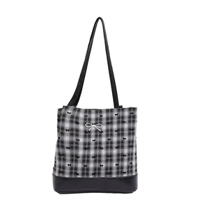 Minimalist black and white plaid tote bag with bow prints and leather shoulder straps