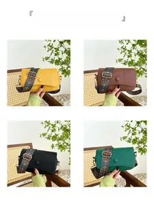 Detail view of retro crossbody bags in four colors with ethnic print wide straps