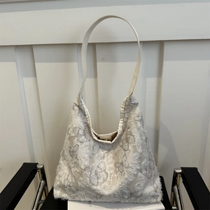 White canvas tote bag with 3D butterfly embroidery and comfortable leather straps