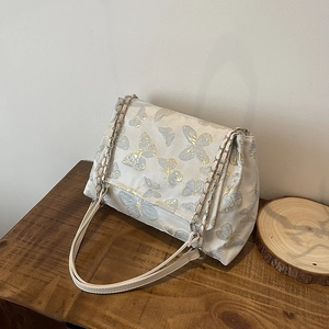 Sac fourre-tout en tissu blanc avec broderie élégante de papillons dorés et argentés