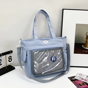 Light blue large capacity tote bag with transparent pocket and adjustable shoulder strap