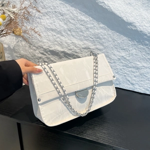 White marble pattern faux leather shoulder bag with silver chain strap and metal clasp