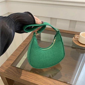 Retro emerald green crescent hobo bag with embossed crocodile pattern and gold zipper