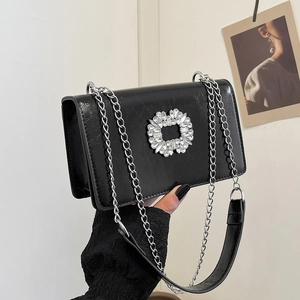 Elegant black glossy leather square crossbody bag with rhinestone flower buckle and chain