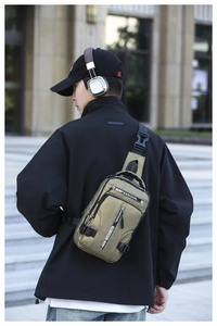 Outdoor crossbody sling bag detail featuring waterproof nylon fabric and adjustable strap