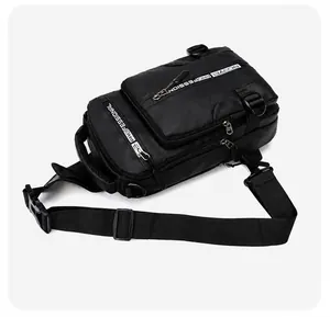 Detail of waterproof black crossbody bag with multiple zippers and mesh handle