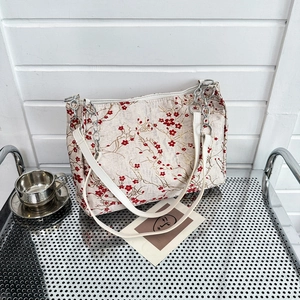 Elegant off-white tote bag with red plum blossom embroidery and metal chain strap